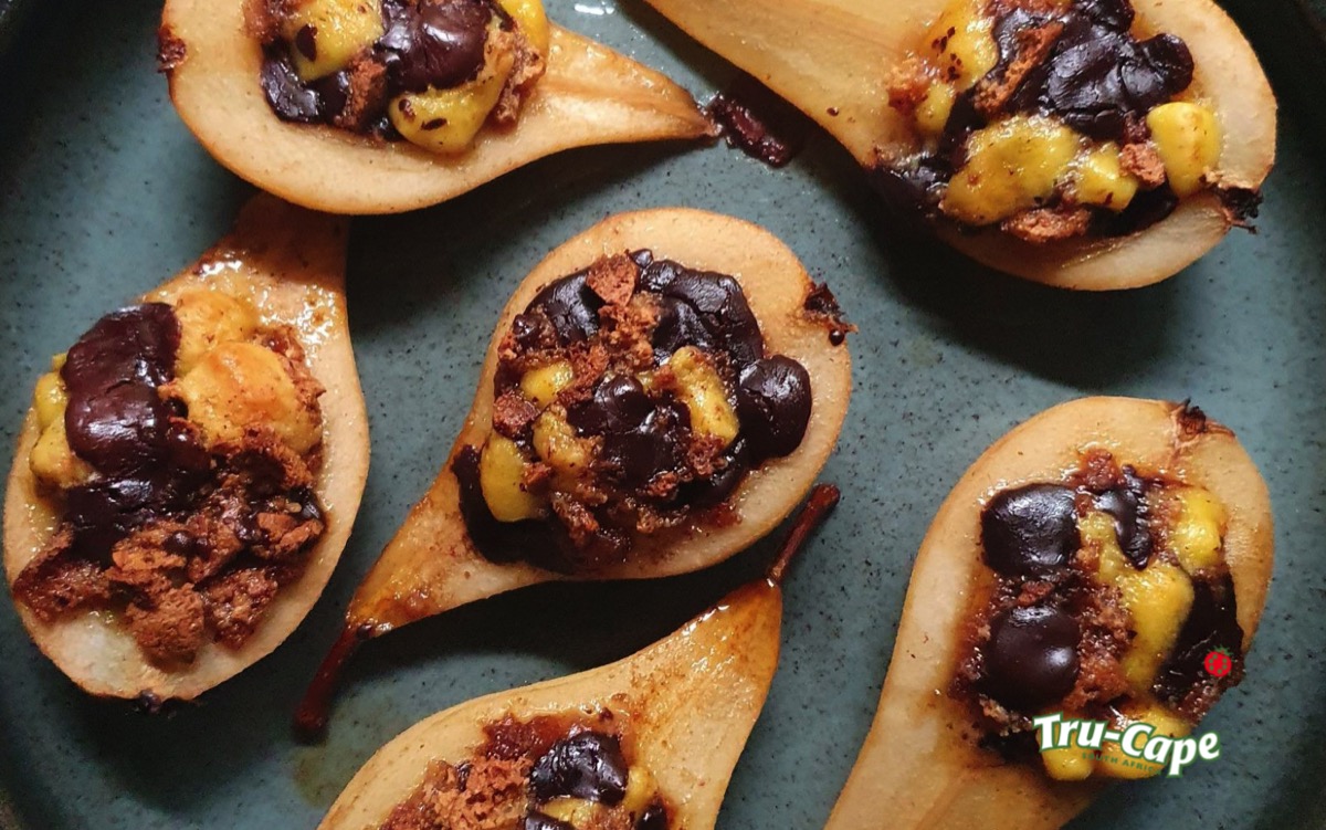 Sherry-baked pears stuffed with chocolate and marzipan